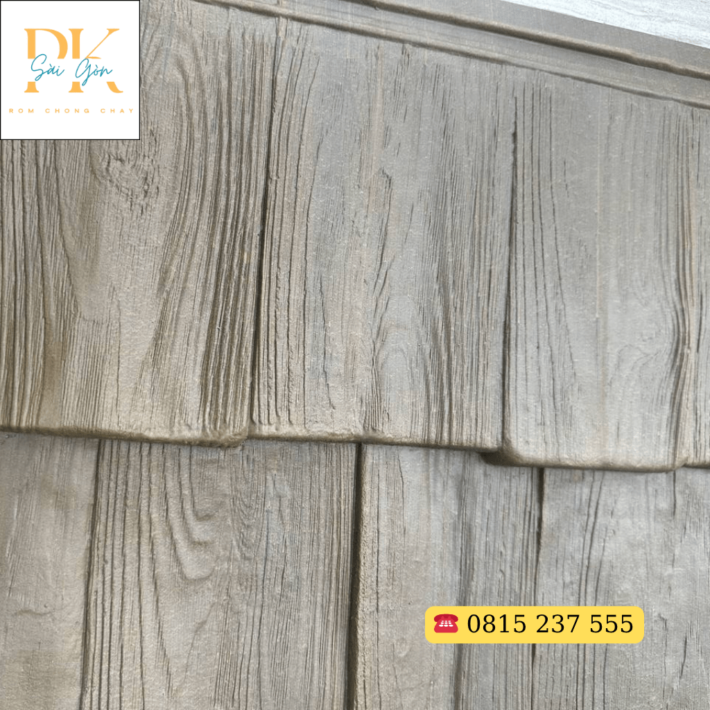 Tấm Nhựa Giả Gỗ Pơ Mu – Giải Pháp Trang Trí Hiện Đại Thay Thế Gỗ Tự Nhiên 4 Cận cảnh màu sắc và vân gỗ của tấm nhựa giả pơ mu